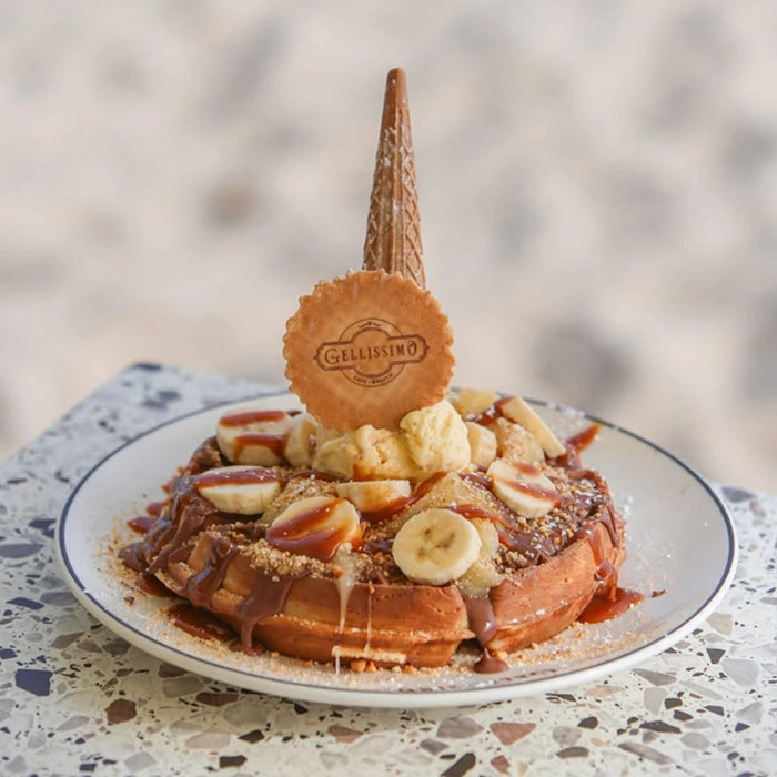 Waffle with praline, banana and biscuit